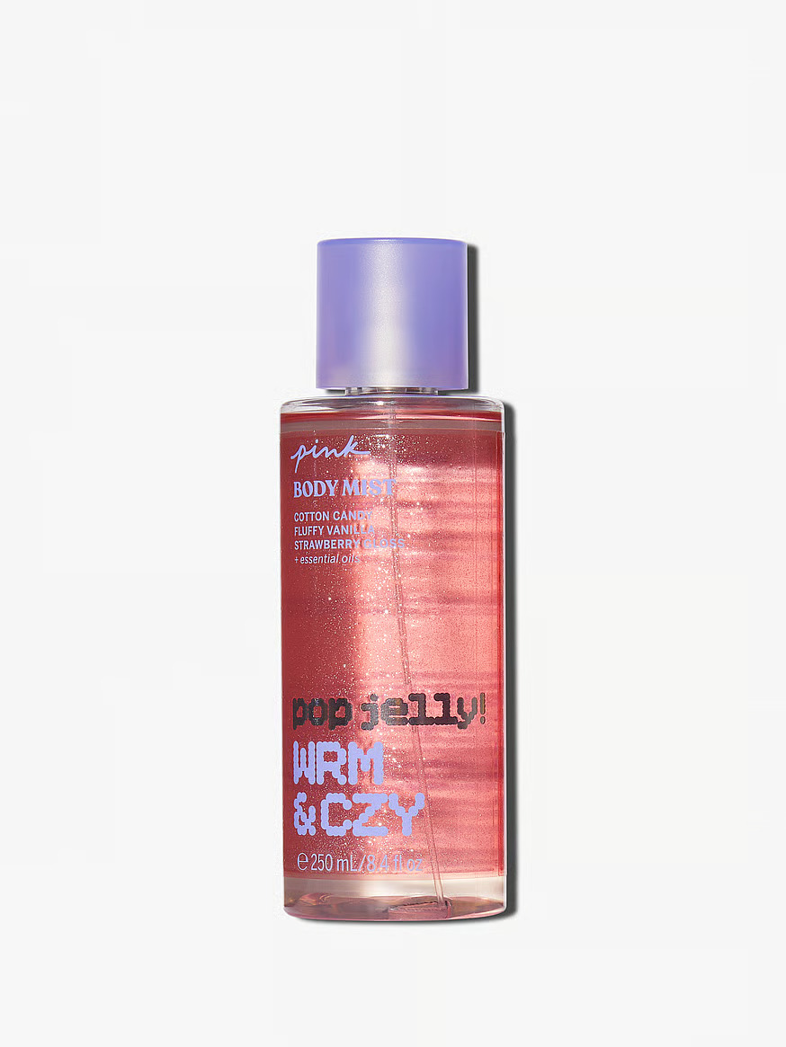 بادی میست Pop Jelly. Warm & Cozy پینک، بطری اسپری ۲۵۰ میلیلیتری روی سطح روشن