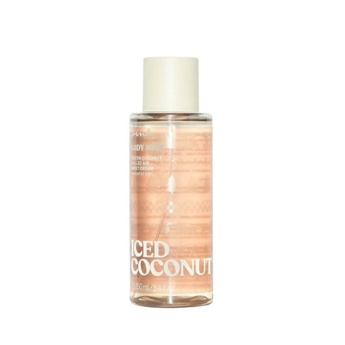 بادی میست Iced Coconut پینک، بطری اسپری ۲۵۰ میلیلیتری روی سطحی روشن