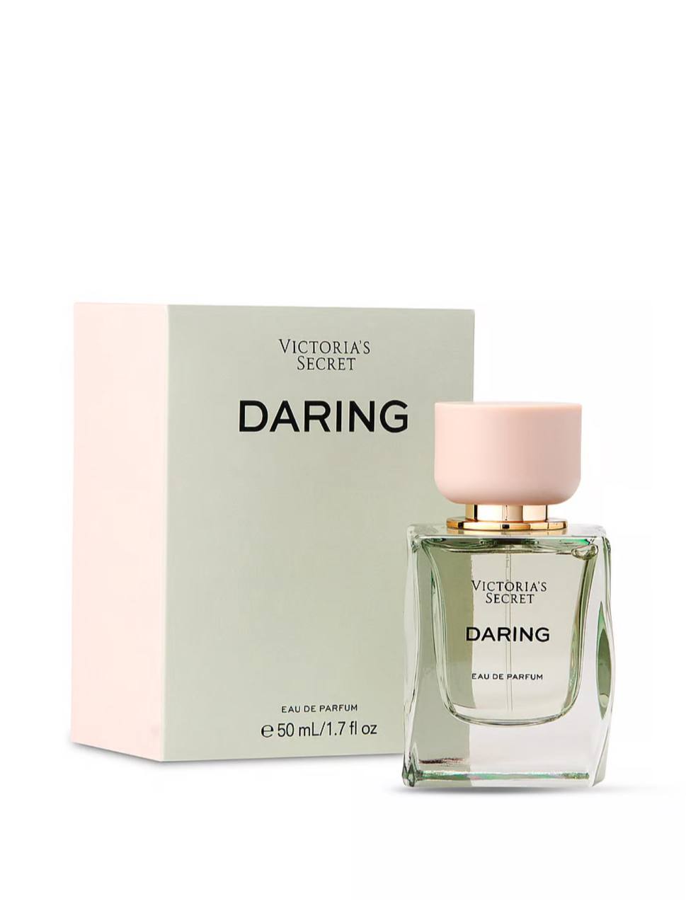 پرفیوم Daring ویکتوریا سکرت در کنار جعبه‌ی اصلی بسته‌بندی