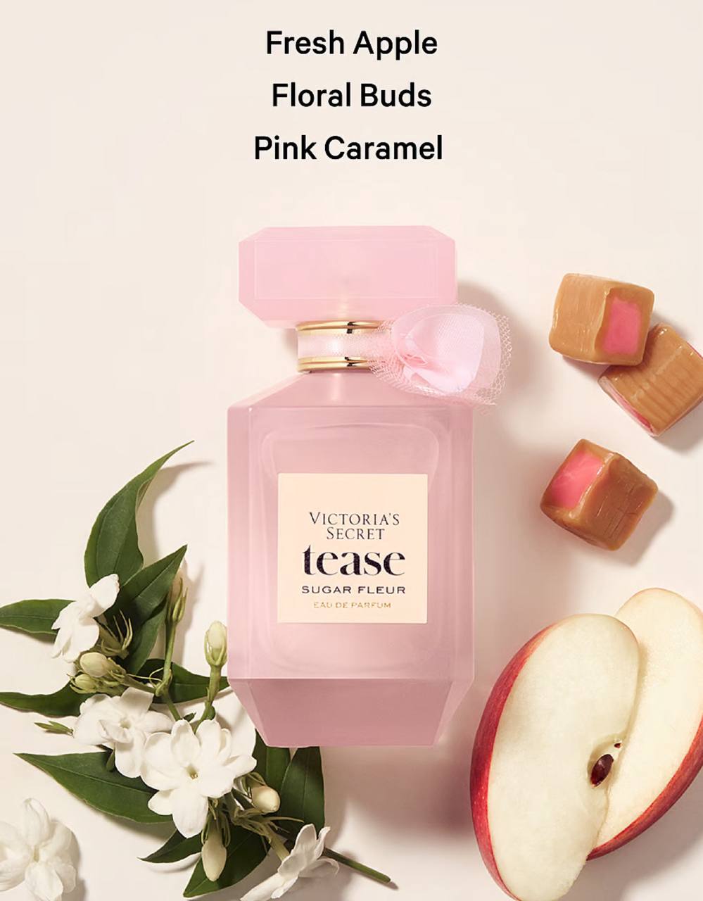 نمای نزدیک بطری ادوپرفیوم Tease Sugar Fleur ویکتوریا سکرت در کنار جعبه‌ی اصلی