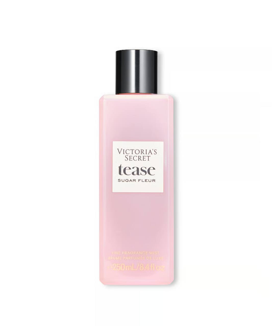 بادی میست Tease Sugar Fleur ویکتوریا سکرت در بطری اسپری شفاف روی سطحی روشن