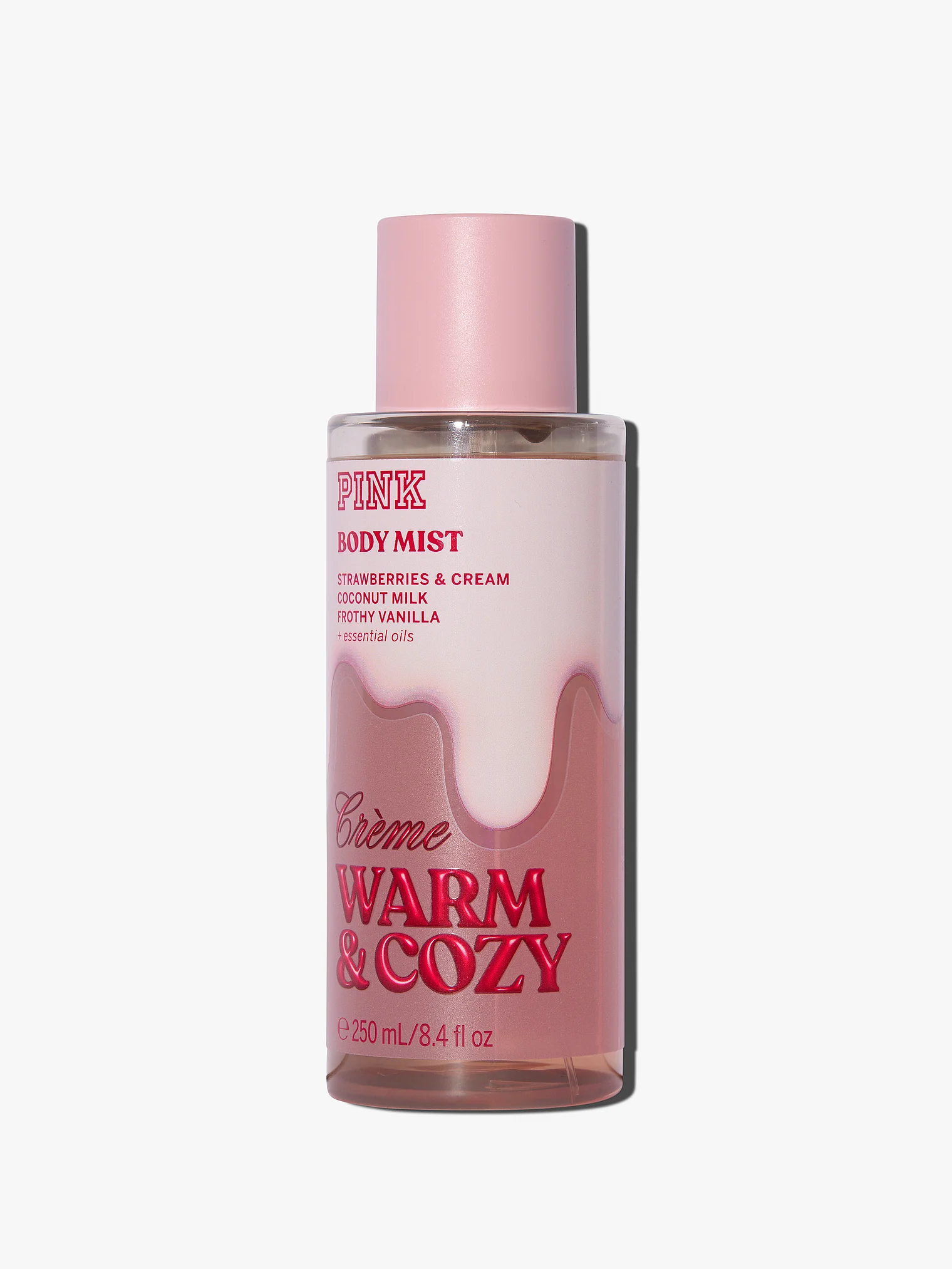 بادی میست Warm & Cozy Crème پینک در کنار بسته‌بندی اصلی برند